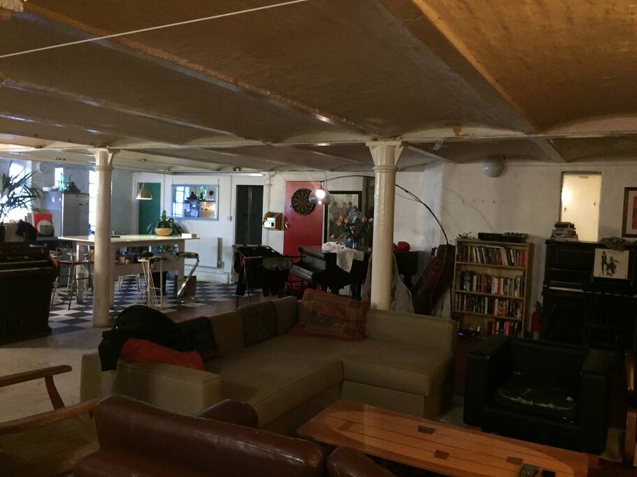 Huge living area with sofas and TV. Welcome to use space and make yourself at home.