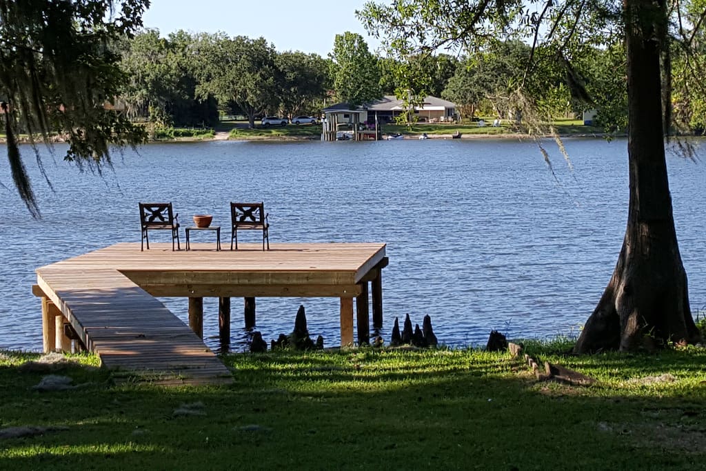 We have a new dock for fishing and sunsets. Check out the old cypress knees to the right.