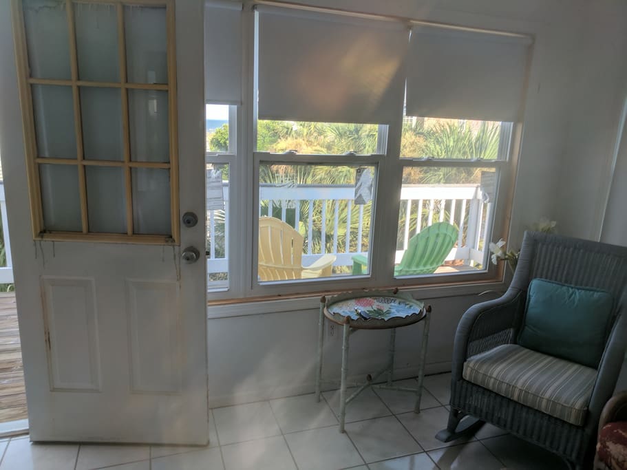 Check out the upper deck with ocean view through this door. With all that ocean breeze you may want to bring your sunscreen in case you feel inspired to catch some rays.
