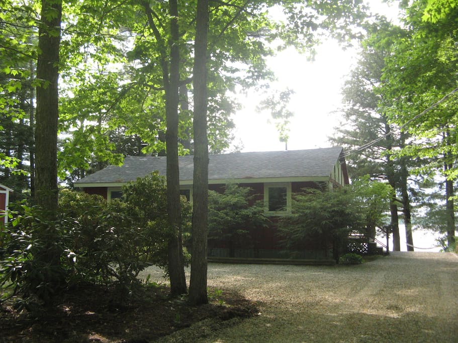 Road side of the cottage. Down the driveway on the right is the campfire pit. S’mores anyone?!