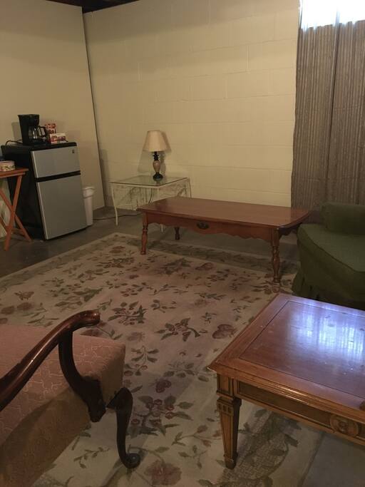 Studio living space. Refrigerator for your convenience..Delicious morning coffee or hot water for tea.