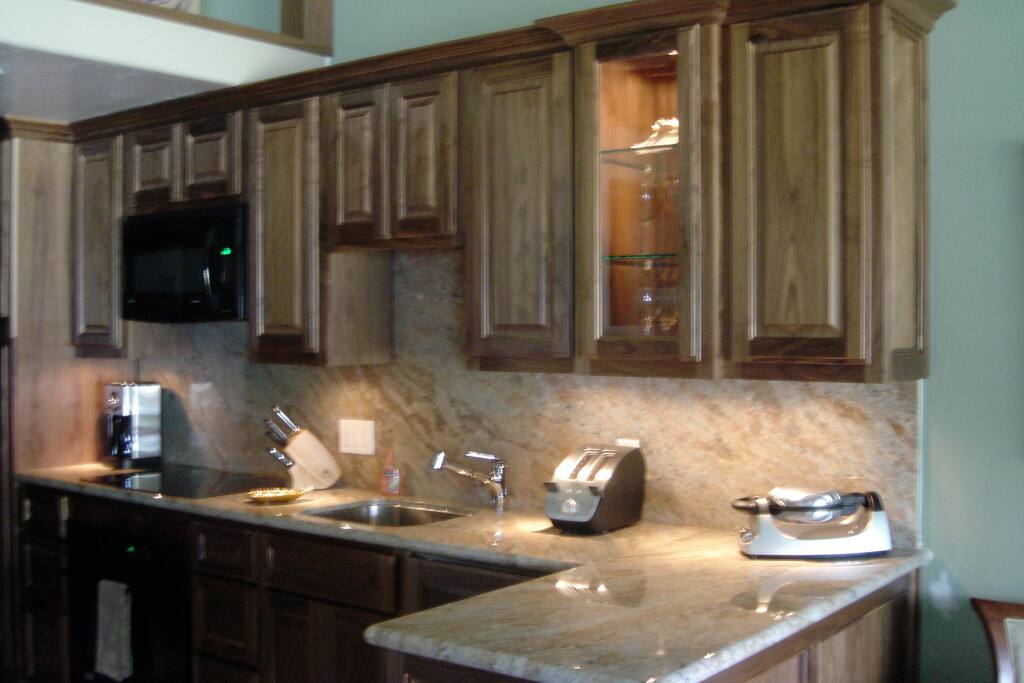Full Kitchen with a subzero fridge.