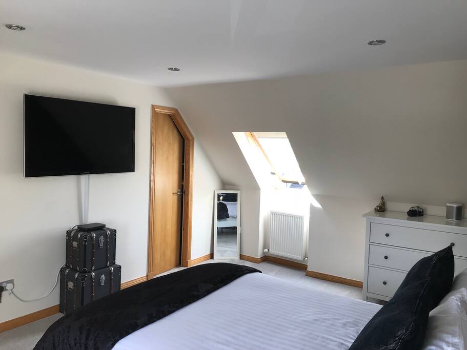 50” Wall mounted tv in bedroom.