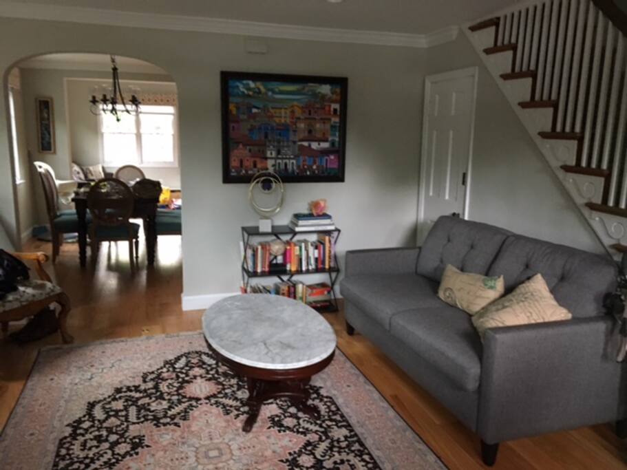 Walk into our living room. Sofa is a queen pullout. TV in this room