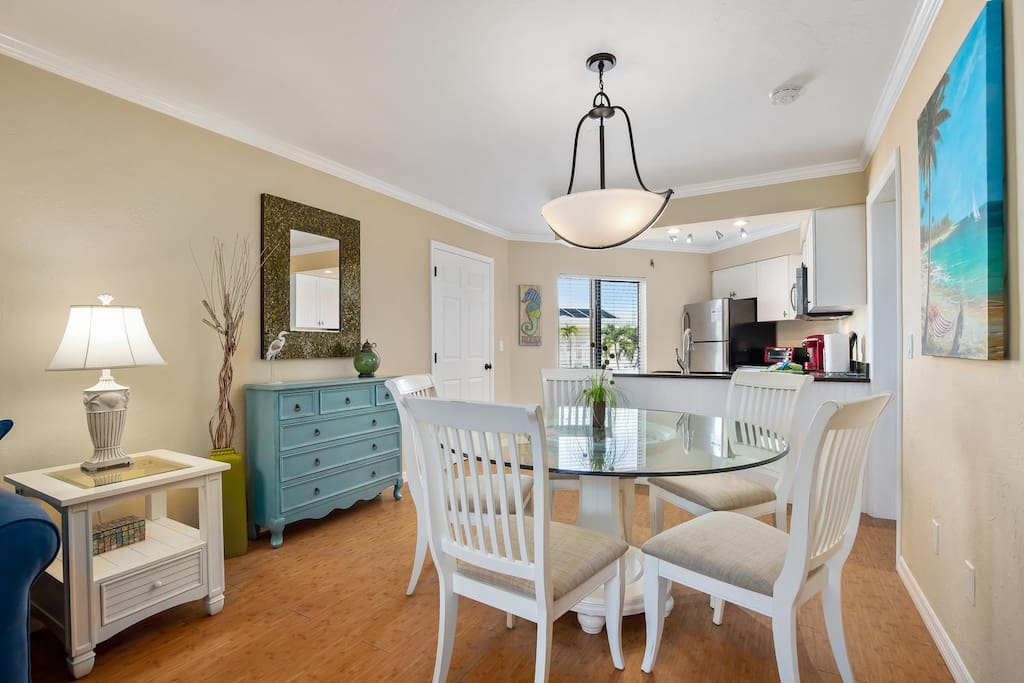 Dining area looking to kitchen