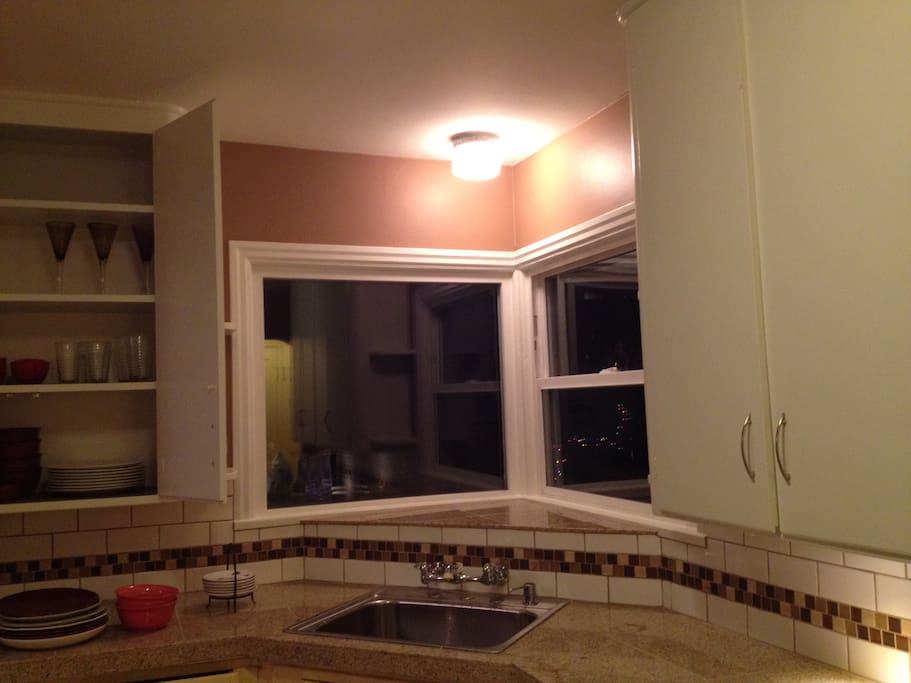 recently remodeled kitchen, with amenities: coffee maker, microwave, toaster, & blender.