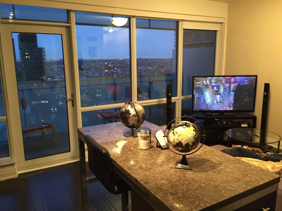 55" TV w/ Apple TV, xBox, Netflix and CraveTV (HBO, Showcase, and more). Plus the beginning of a solar system on the kitchen counter :)