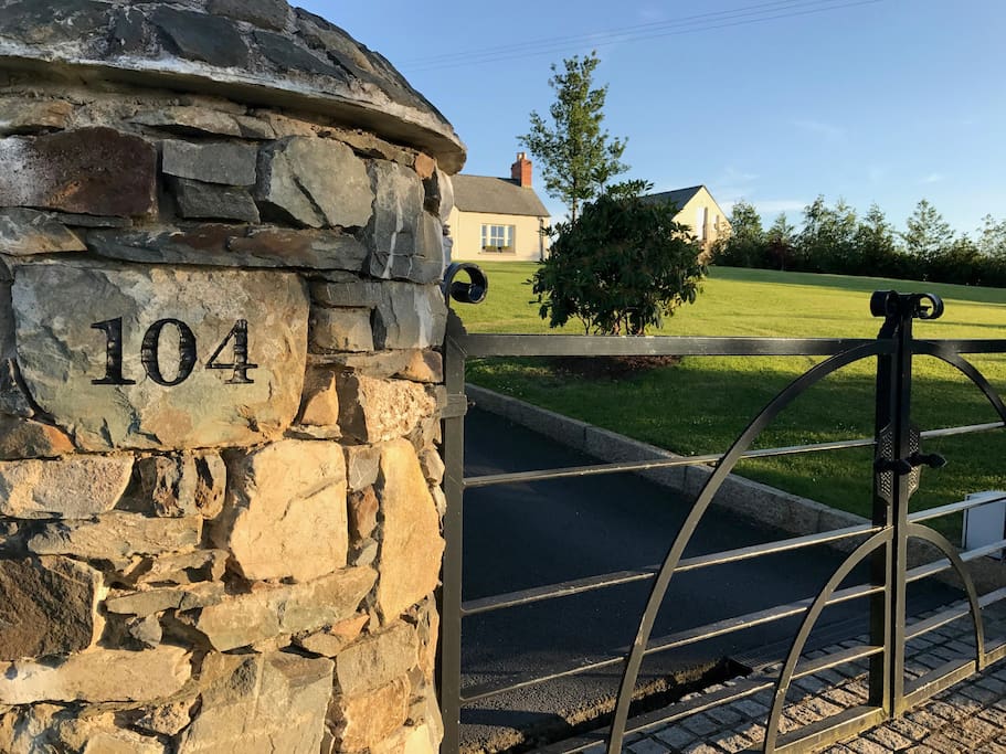 Electric gates with private guest parking
