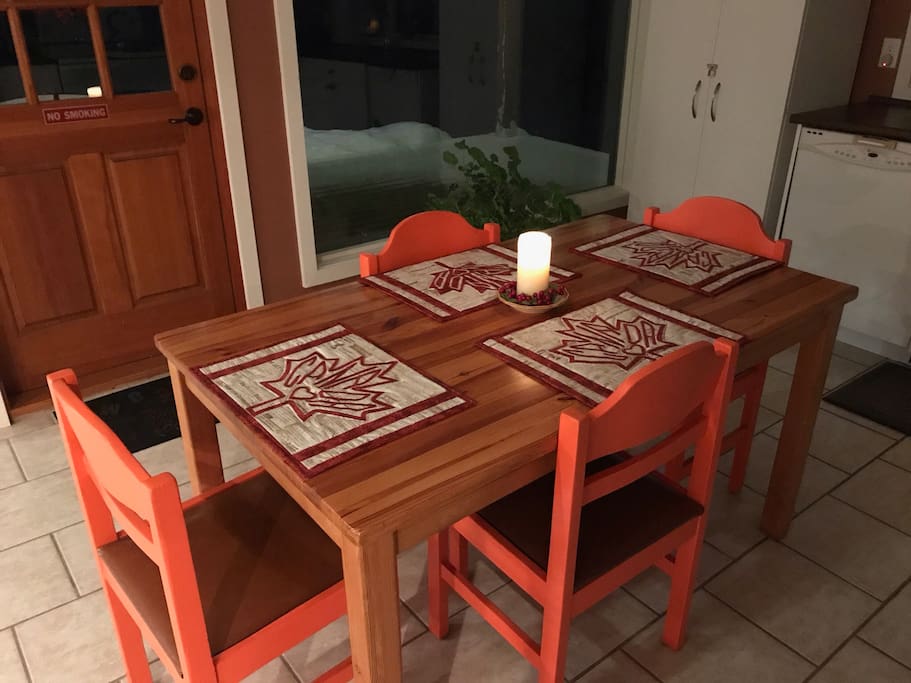 Pine table and chairs in spacious kitchen