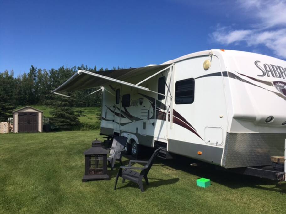 28' sabre sleeps 6. Fire pit and picnic table right outside your door.