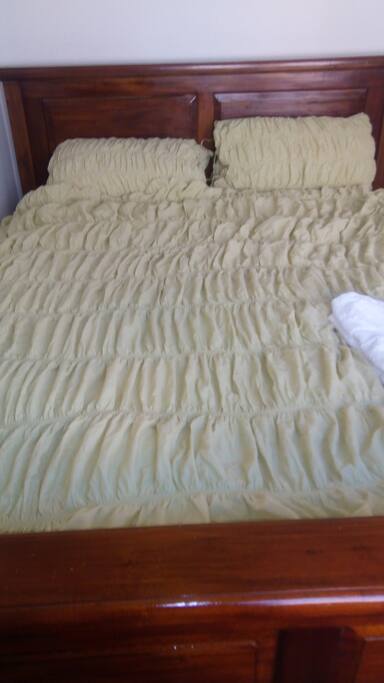 Very comfortable queen size bed and luxury bedding, both doona and underlay are dry cleaned regularly