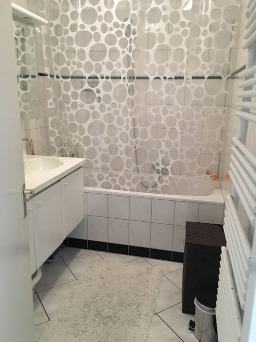 Bathroom with bath/shower and double sink