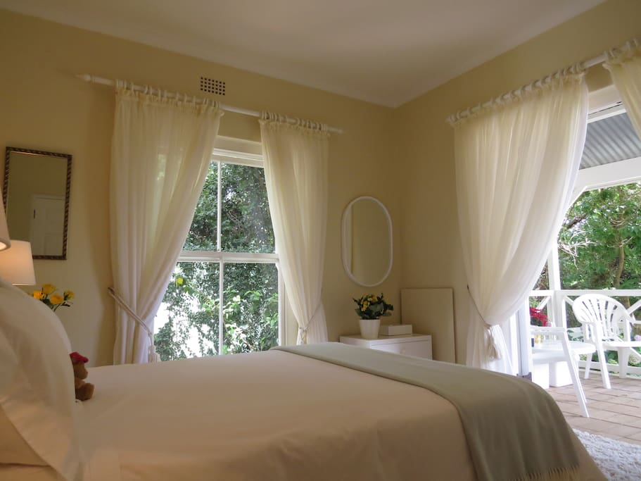Bedroom with view of patio