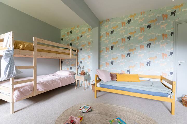 The DORTOIR-
 6 beds including 2 bunk beds, 1 bench bed 70x160cm, 1 single mattress on the floor. 