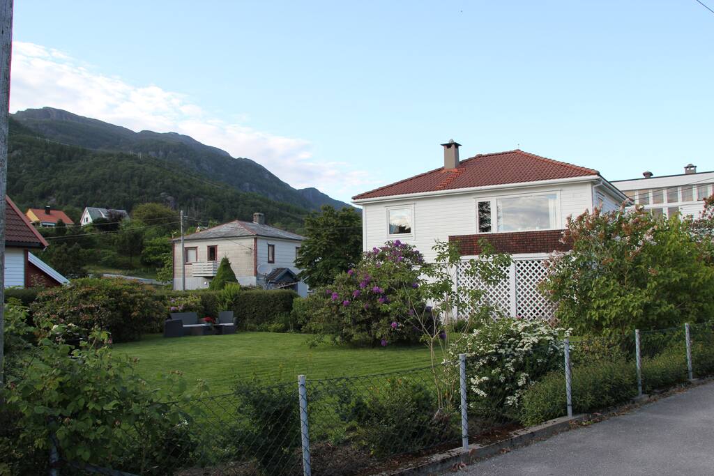 there is a big garden around the house