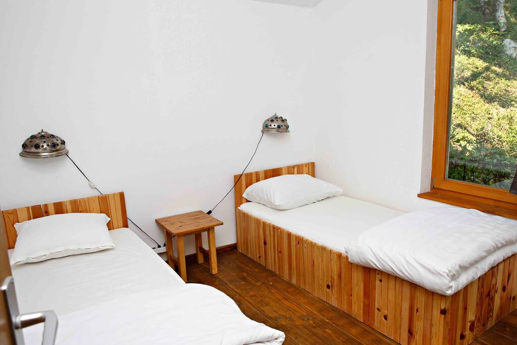 Twin beds suitable for adults and children