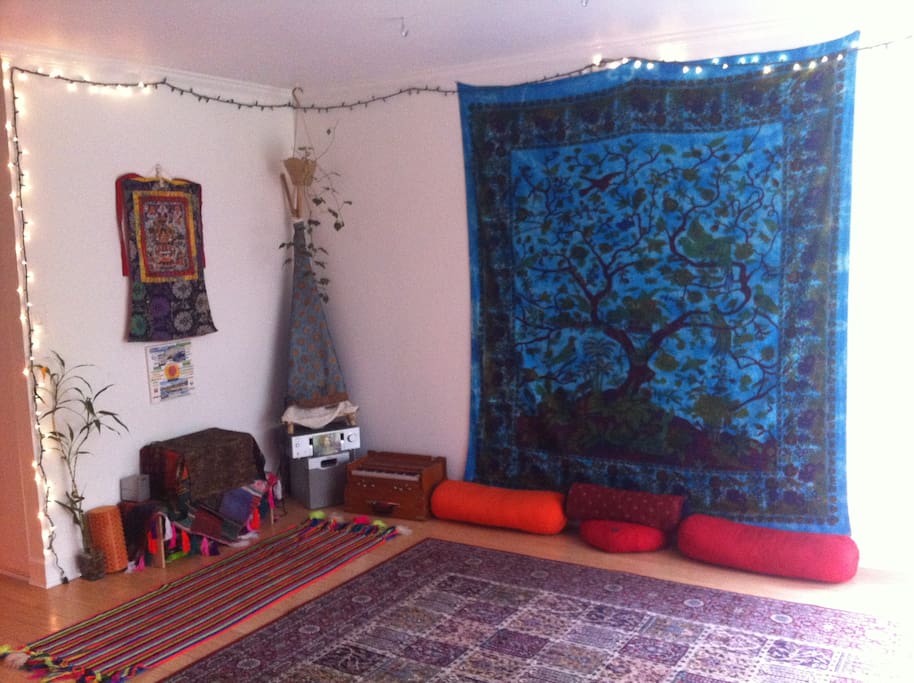 Living Room... comes with bolsters, drums, a harmonium, a yoga mat, a body roller, and an amazing stereo that you can easily plug your music into! No "normal" furniture!