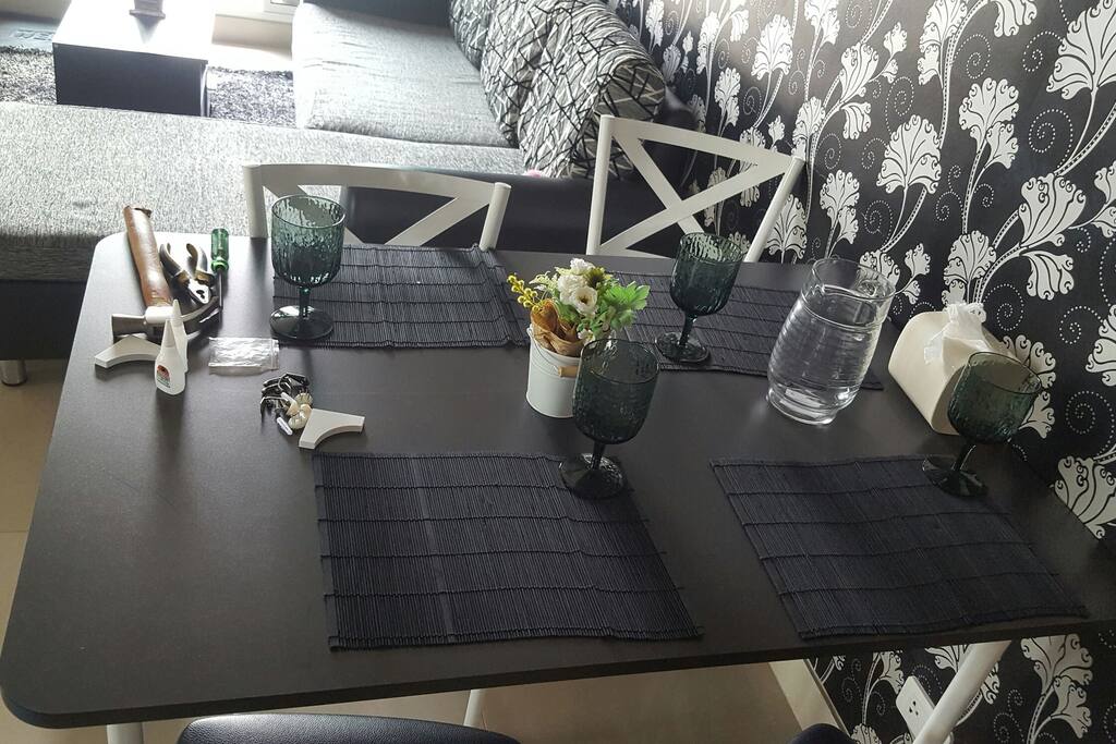 The living room of bigsize open , as well as TV wifi and a table for lunch four well as decorative luxury style