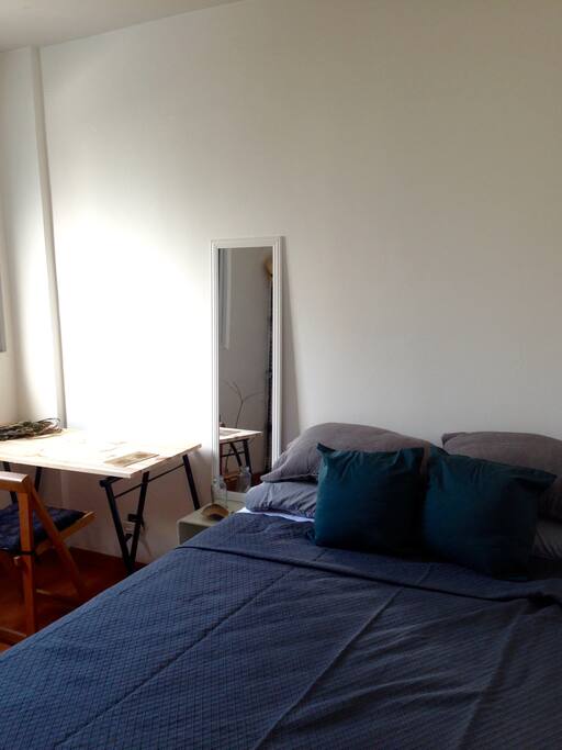 The bedroom | Bed, full body mirror and workdesk