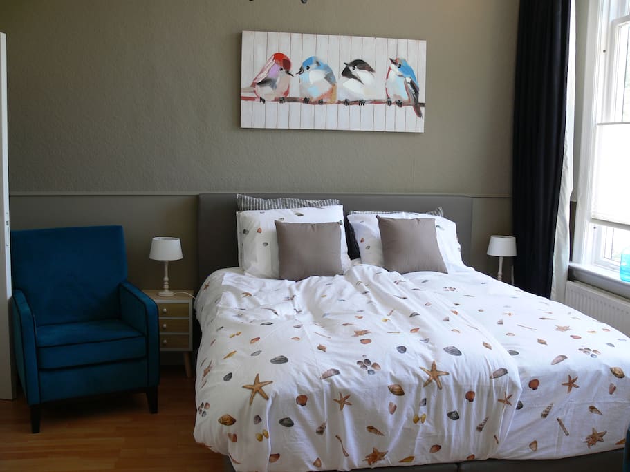 The room with double boxspring bed