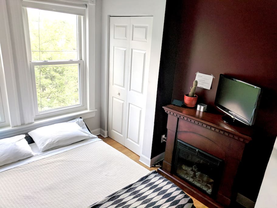 Side view of the private guest room with a Chromecast and TV for your viewing use.