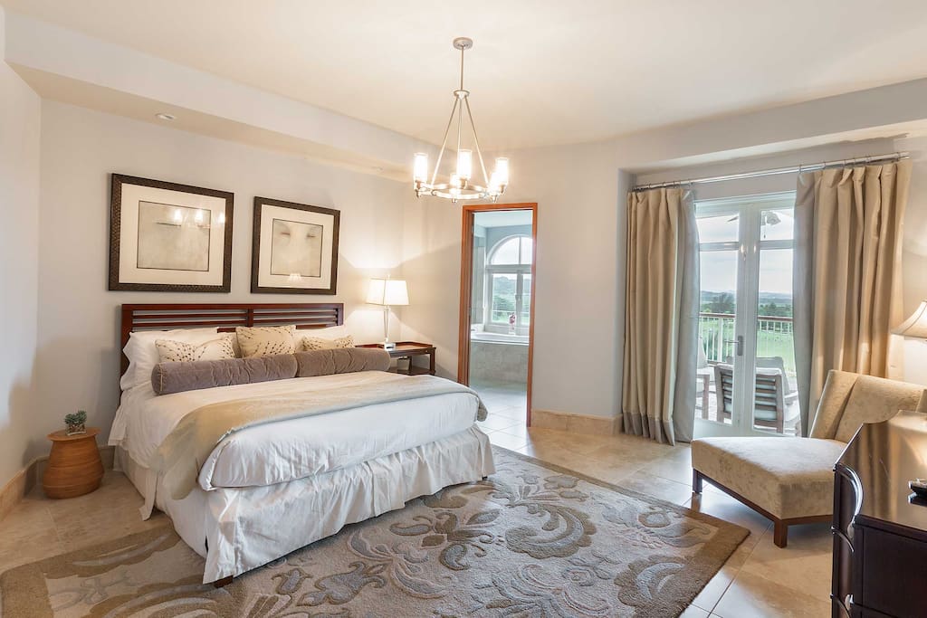 Expansive, master suite with balcony