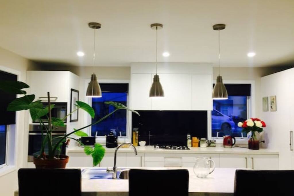 The kitchen is designed for open living space with the large living room and has everything you will need including gas cooking, microwave, slow cooker and most important a Dish Washer!
