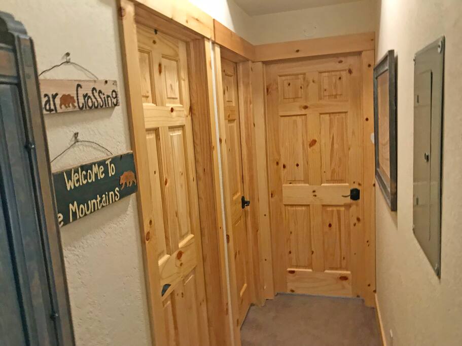 Solid knotty pine doors and 5" knotty pine baseboard trim throughout the condo with oil rubbed bronze finishings.
