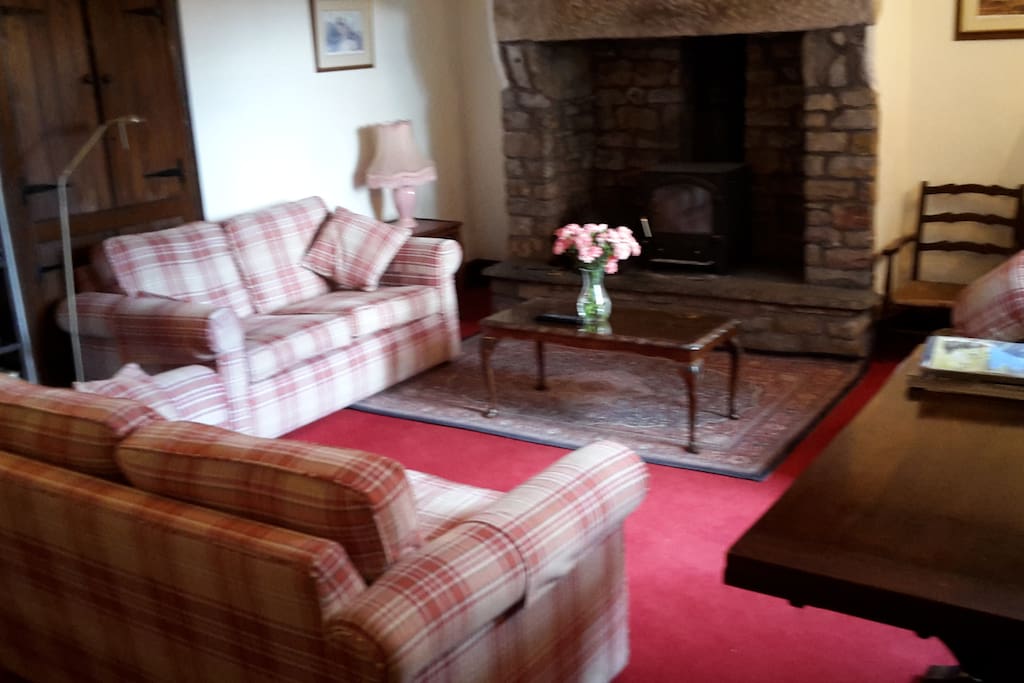 A private lounge with woodburner