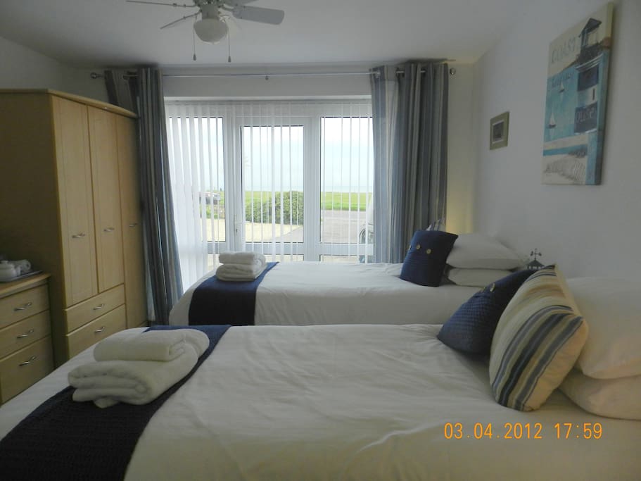 Patio doors leading onto decking area