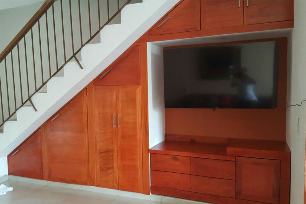 Flat screen tv with Hi Def, and great image processor. The stairs go to a storage room (Not part of the house)