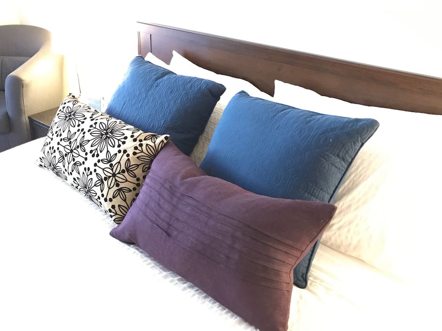 Comfy bed & lots of pillows.