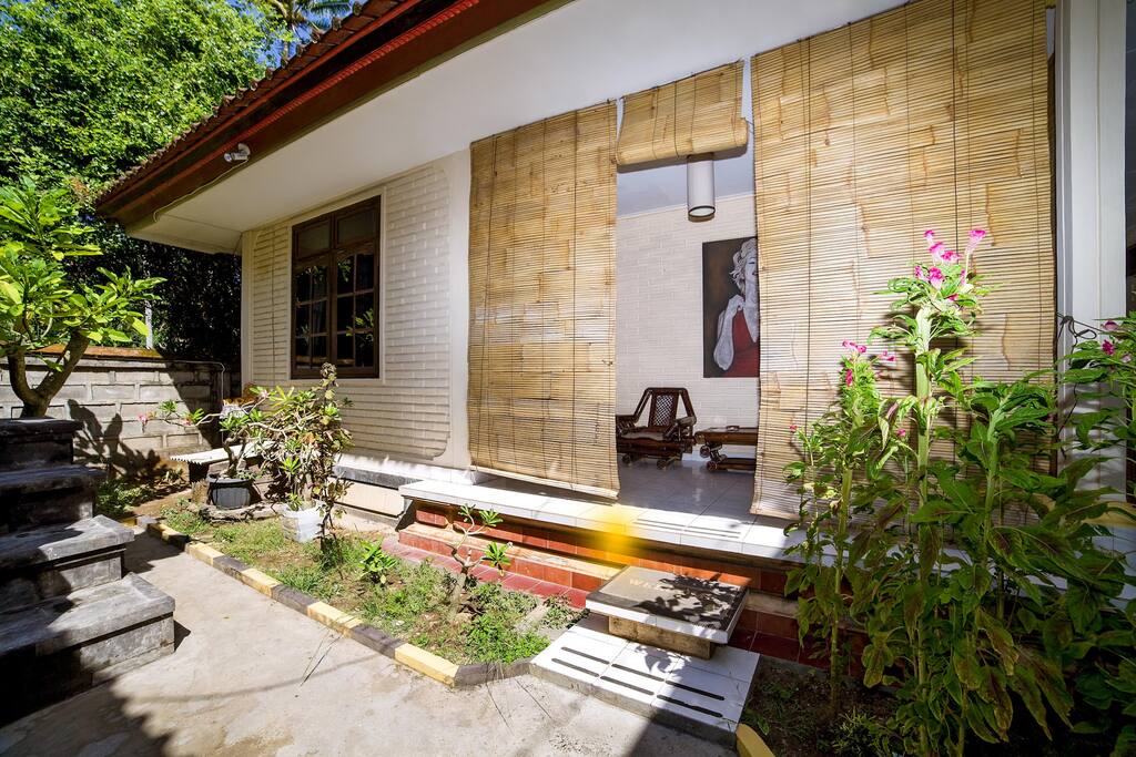 Private renovated patio with sitting area.