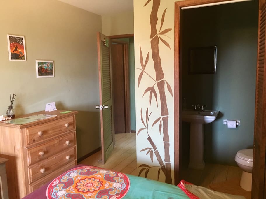 Entry to ensuite powder room (toilet and sink) is pictured on far right of photo. Your private shower is located outdoors.