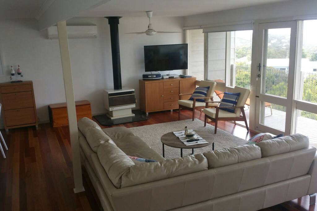 Upstairs - large living room with fire and 50' TV