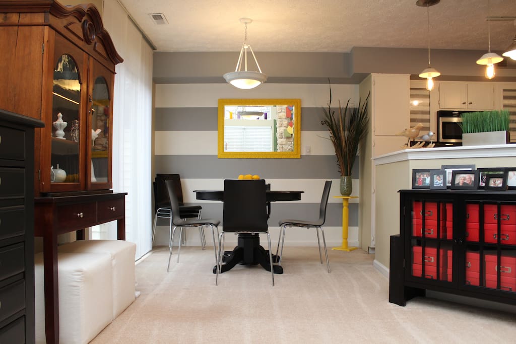 Dining room overlooks the patio, kitchen and living room.