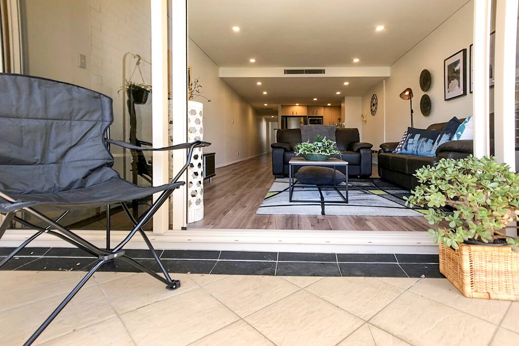 Spacious living / dinning area leads out onto main balcony.