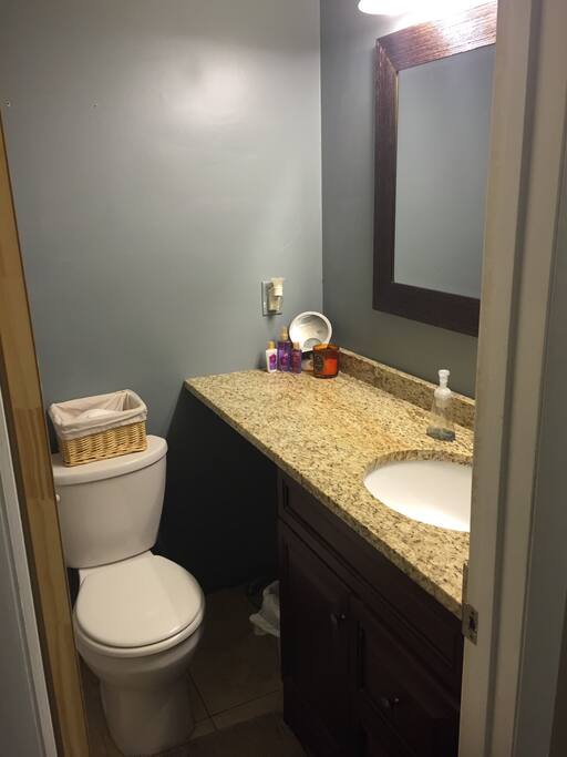 Private bathroom adjacent to your bedroom. Large countertop, tub/shower combo.
