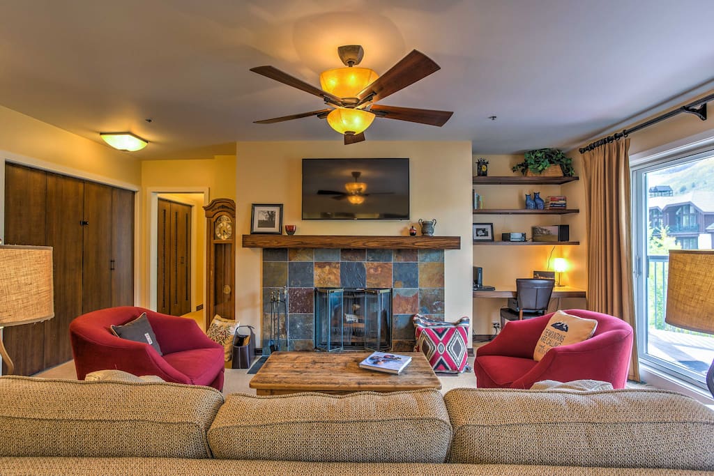 Share quaint evenings in front of the wood-burning fireplace in the living room.