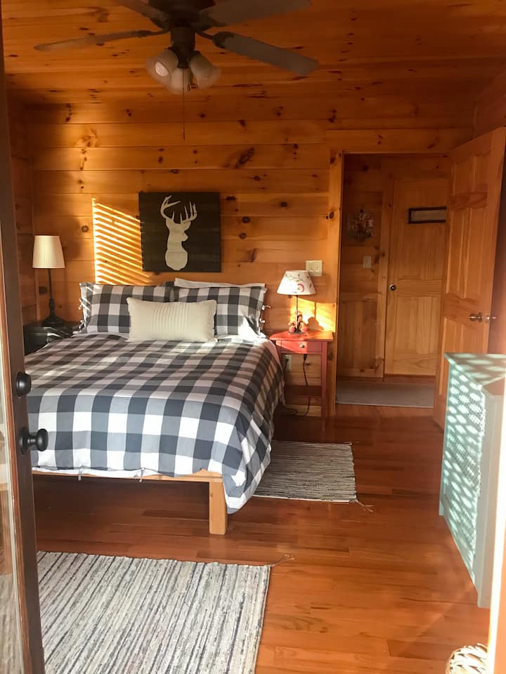 1st floor bedroom opens to deck with views