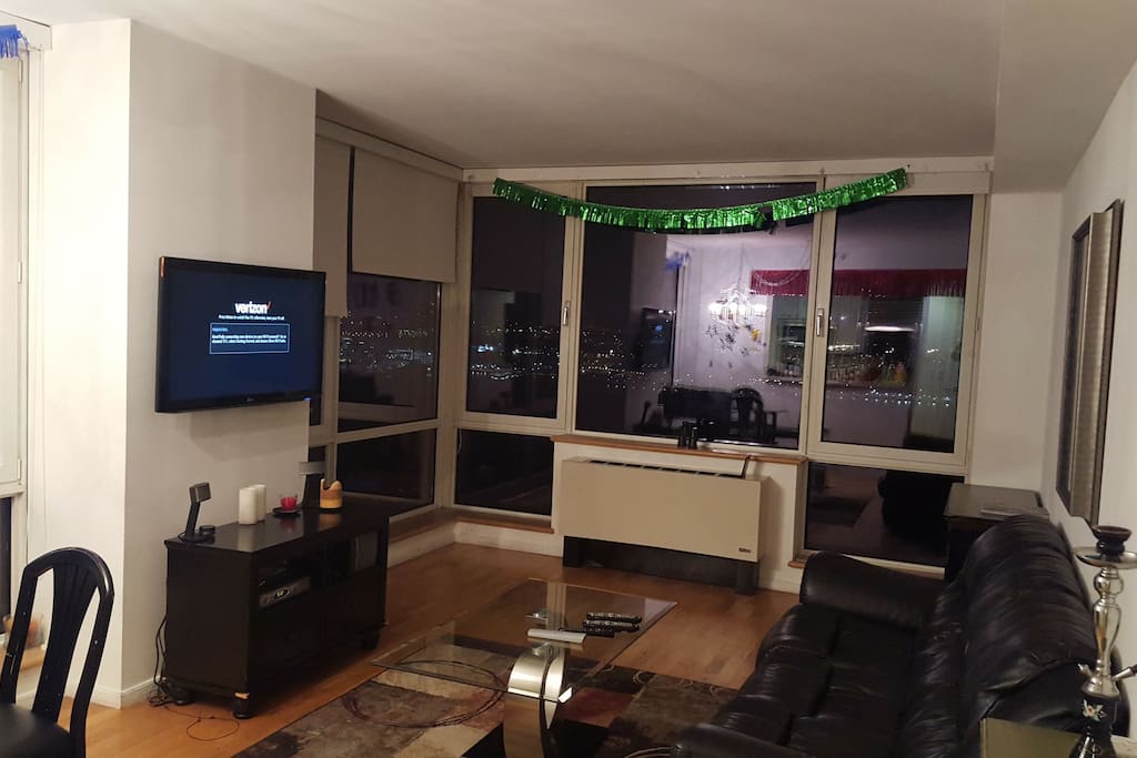 living room including 42" fkat screen tv with movie channels and 2 bluetooth sound systems