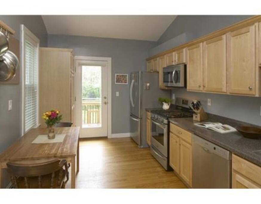 This is a kitchen, with a table; you can cook AND eat here (and you should feel free to).