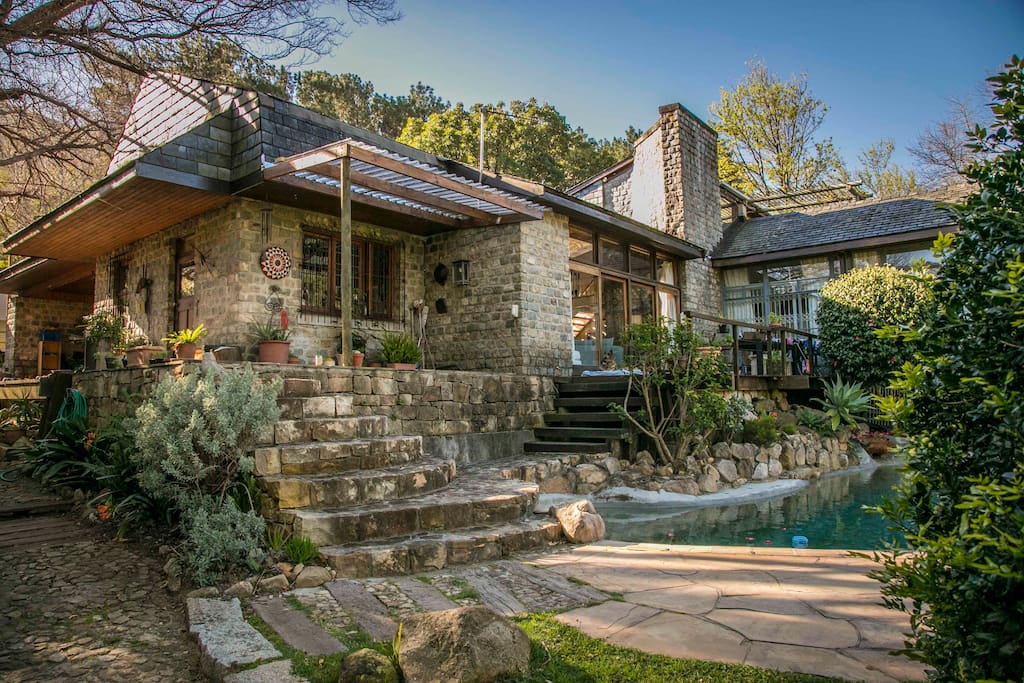 Beautiful stone and wooden veranda above the pool