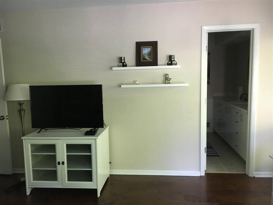 Roku TV and Entrance to Ensuite Bathroom