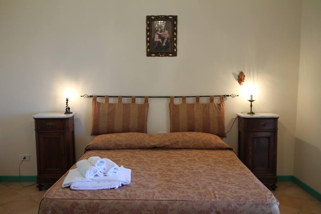 The Bedroom: the comfortable double bed with soft bed-linen and towels
