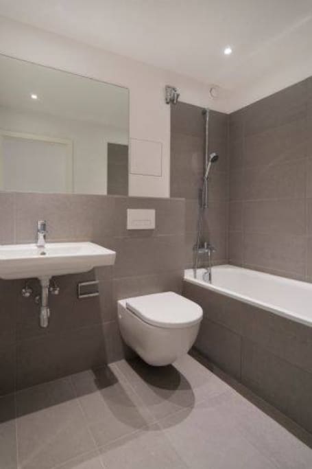 Newly renovated bathroom with tub