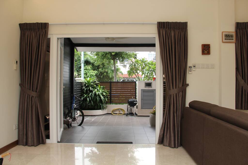 Front yard - View from the inside of the house. The curtains can be drawn for added privacy.
