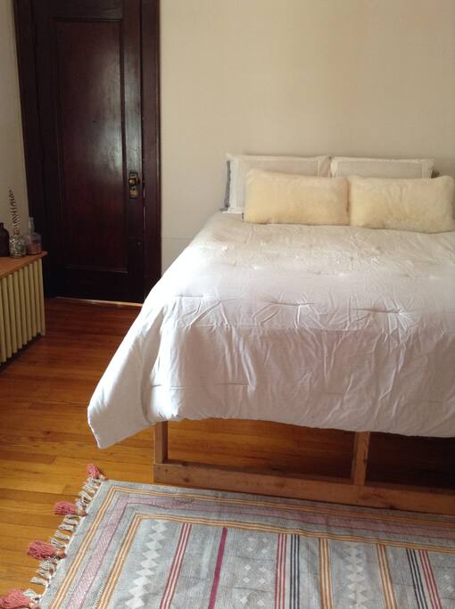 Queen bed in master bedroom upstairs. Closet space, great light.