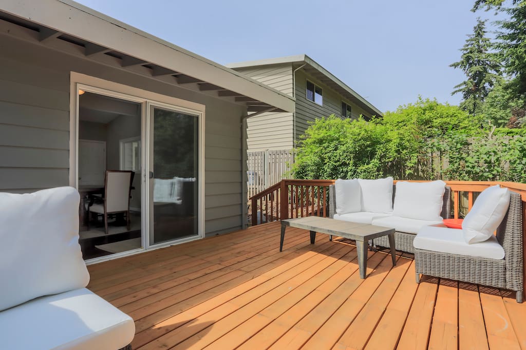 The patio features plenty of outdoor seating for relaxing and outdoor meals.