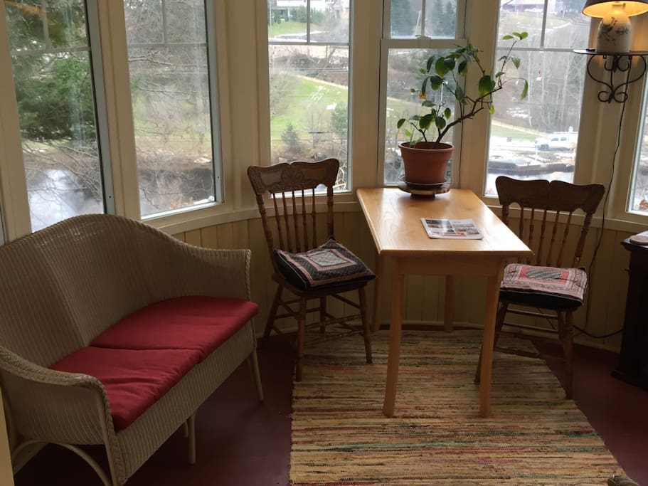 Morning views and relaxation in the round sunroom overlooking the Magnetawan River
